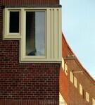 Gevel Afrikanerplein met kozijnen.
<br/>
Gert-Jan Lobbes, 2015